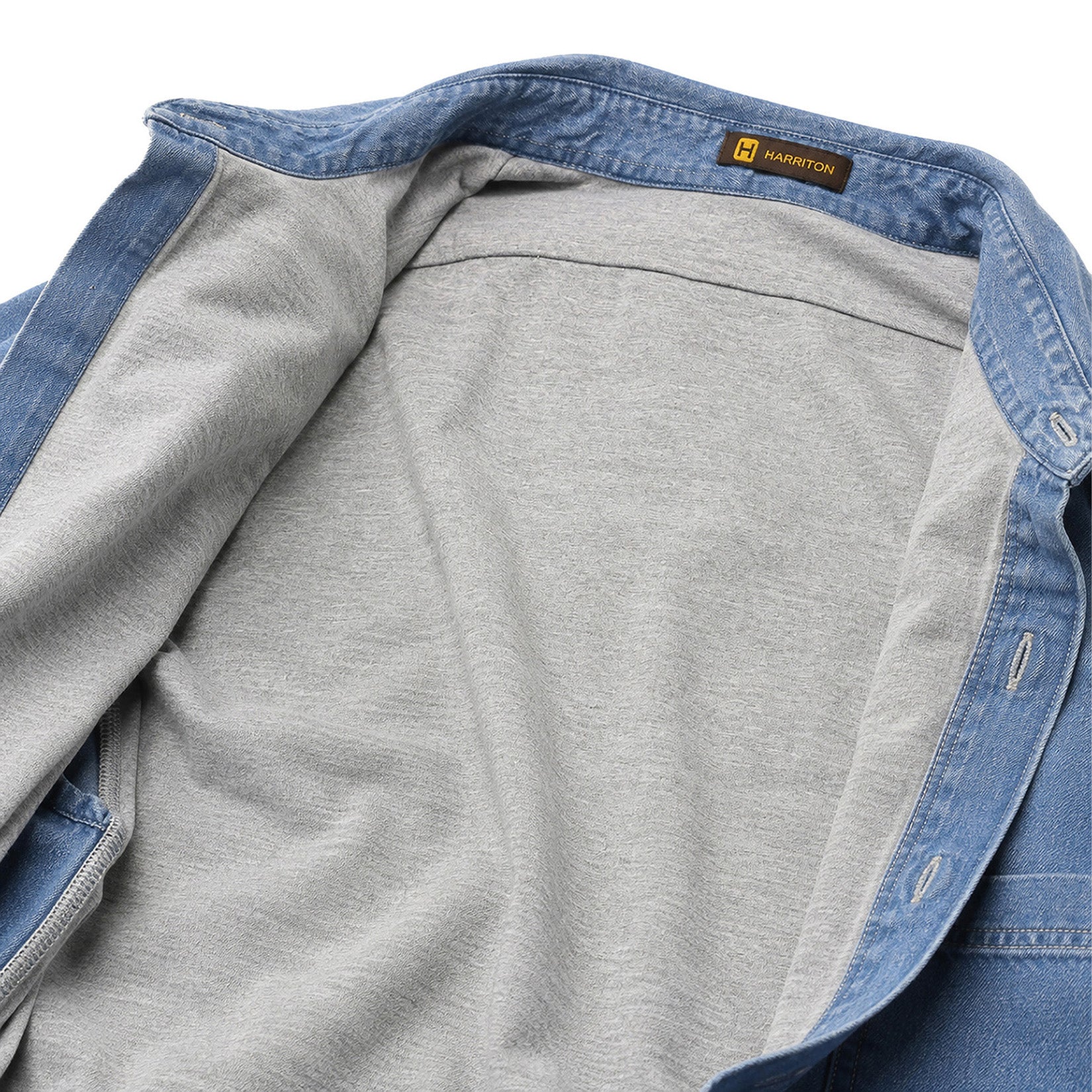 Interior of Marines denim shirt jacket showing soft gray 65/35 polyester-cotton jersey lining for added warmth and comfort.