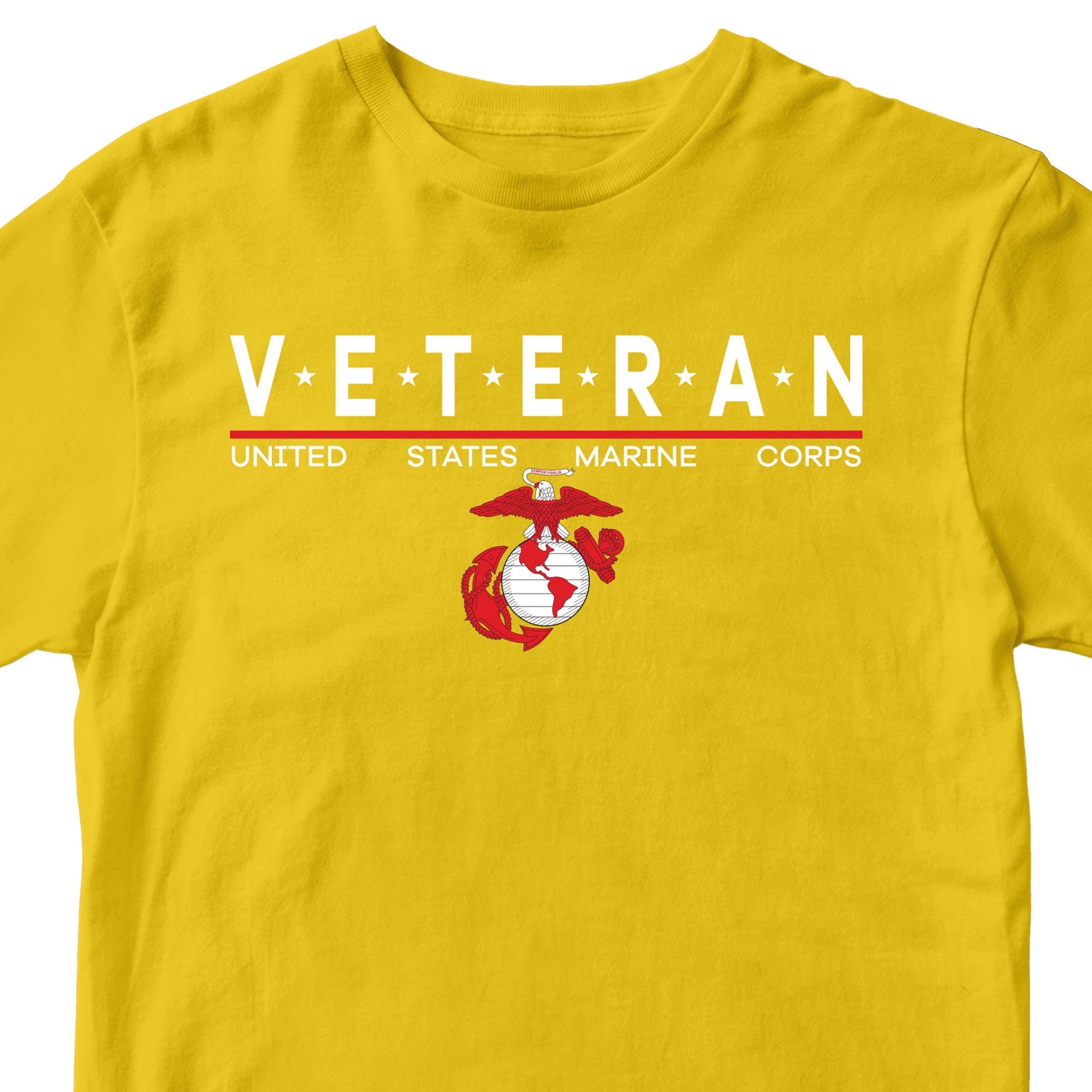 Gold USMC Veteran T-shirt with star-accented ‘VETERAN’ text and Eagle, Globe and Anchor emblem.